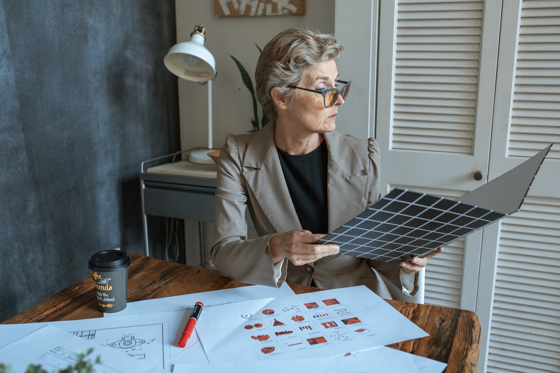 woman looking into a business paper