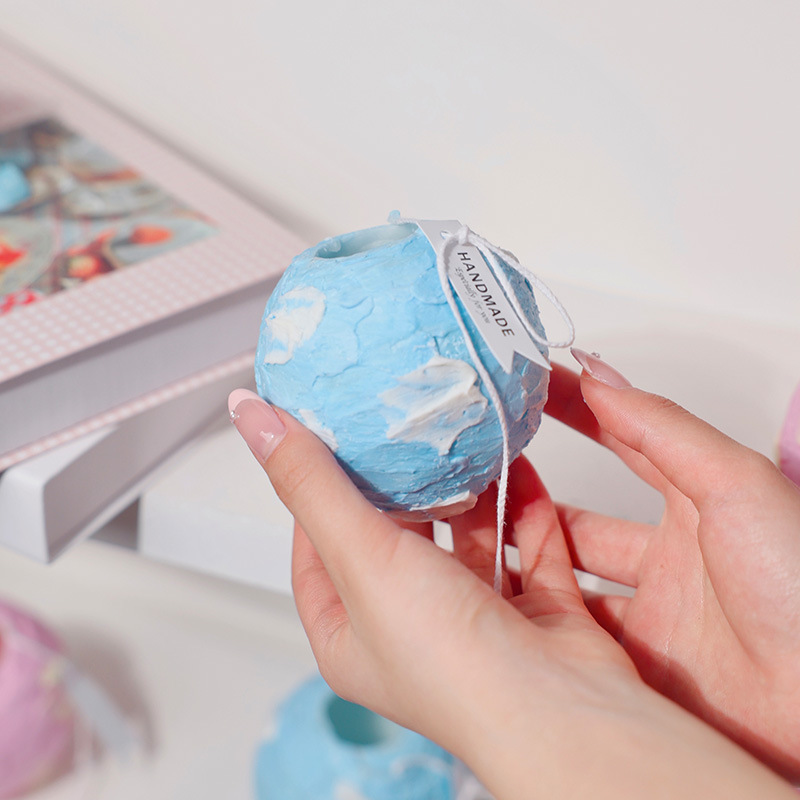 Rotating Planet Sculptural Candle - Image 5