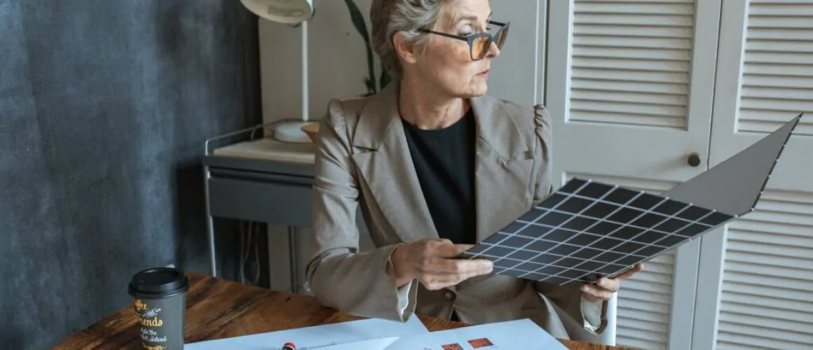 woman looking into a business paper